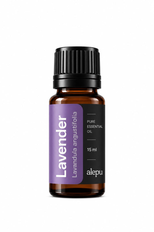 An amber glass bottle of Alepu Lavender essential oil with a lilac label, 15 ml